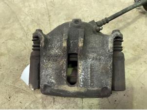 Used Front brake calliper, left Renault Megane II (BM/CM) Price € 25,00 Margin scheme offered by F. van den Mosselaar autodemontage