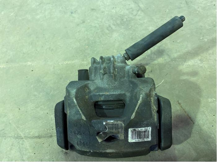 Front brake calliper, left from a Peugeot Partner (GC/GF/GG/GJ/GK)  2008