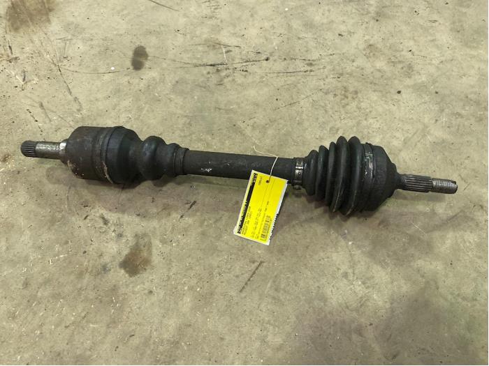 Front drive shaft, left from a Peugeot 206 (2A/C/H/J/S)  2001