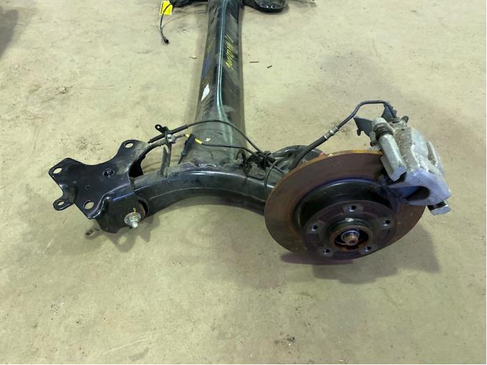 Rear-wheel drive axle from a Renault Megane III Grandtour (KZ) 1.5 dCi 110 2012