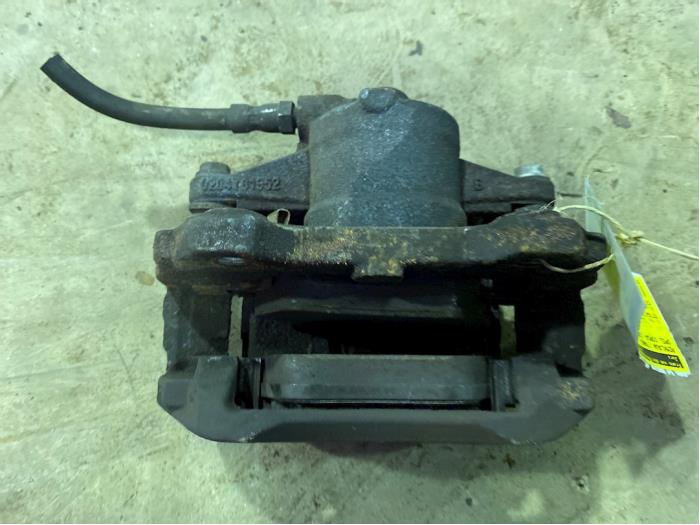 Front brake calliper, left from a Opel Corsa D  2012