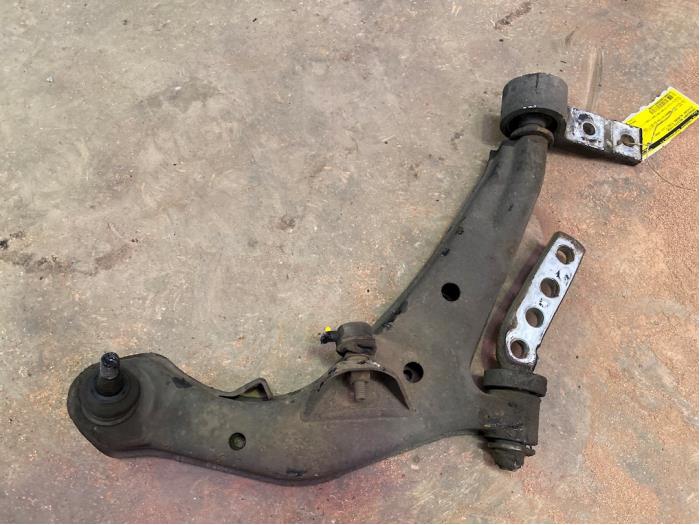 Front wishbone, right from a Nissan Almera Tino (V10M)  2000