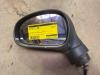 Wing mirror, left from a Seat Leon (1P1) 1.4 TSI 16V 2009
