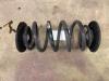 Rear coil spring from a Opel Astra J (PC6/PD6/PE6/PF6) 2.0 CDTI 16V 160 Ecotec 2010