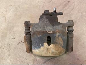 Used Front brake calliper, left Toyota Yaris Verso (P2) 1.3 16V Price € 25,00 Margin scheme offered by F. van den Mosselaar autodemontage