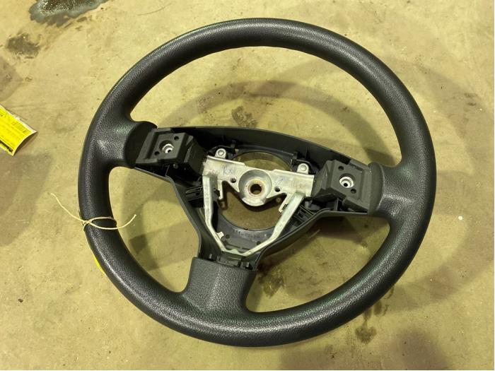 Steering wheel from a Suzuki Swift (ZA/ZC/ZD1/2/3/9) 1.3 VVT 16V 2005