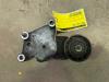 Drive belt tensioner from a Ford Focus C-Max 1.6 TDCi 16V 2004