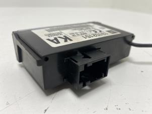 Däcktrycksmodul från en Opel Signum (F48) 2.2 DGI 16V 2004