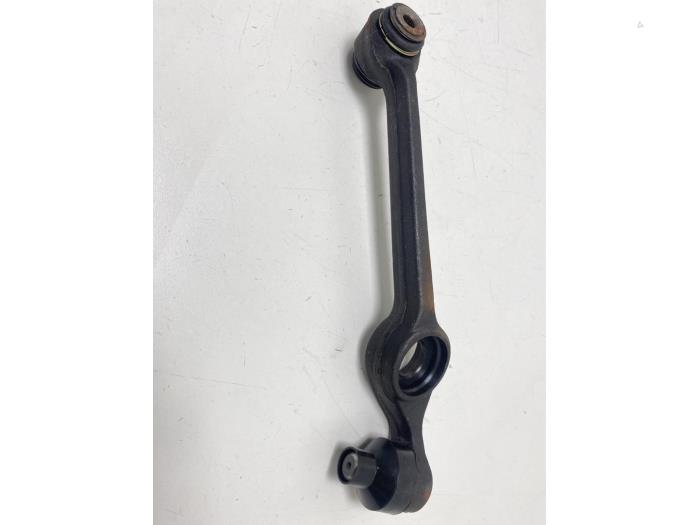 Front lower wishbone, left from a Ford Escort 4 (AAF/ABF/GAF)  1988