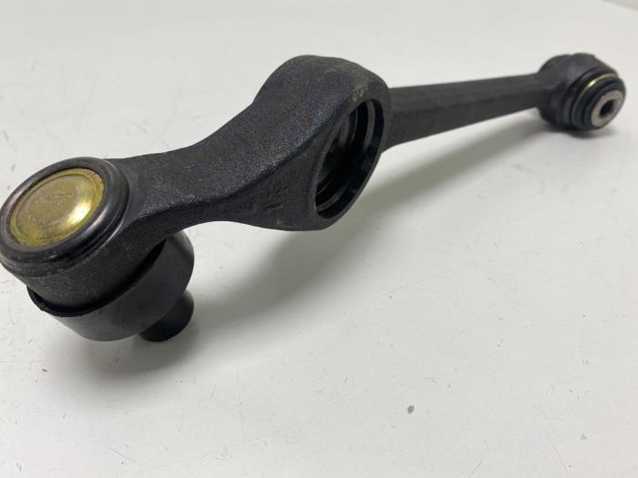 Front lower wishbone, left from a Ford Escort 4 (AAF/ABF/GAF)  1988