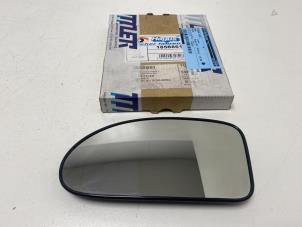 Used Mirror glass, left Ford Focus 1 1.4 16V Price € 7,50 Margin scheme offered by F. van den Mosselaar autodemontage