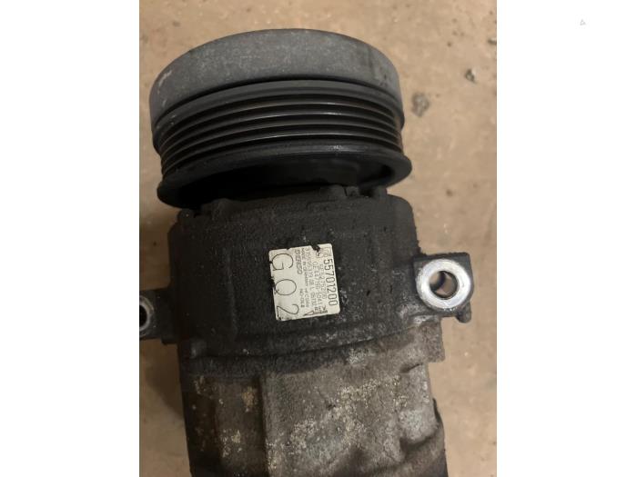 Air conditioning pump from a Opel Corsa D 1.4 16V Twinport 2009