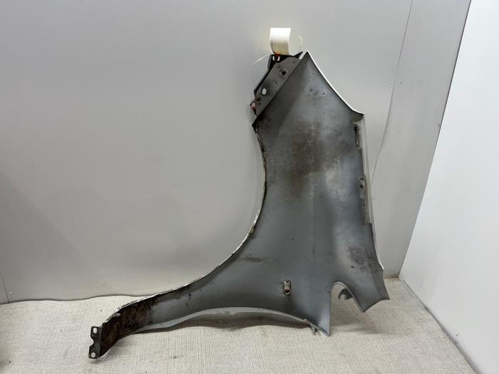 Front wing, right from a Opel Corsa D 1.4 16V Twinport 2009