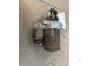 Anlasser van een Mitsubishi Colt (Z2/Z3) 1.3 16V 2005