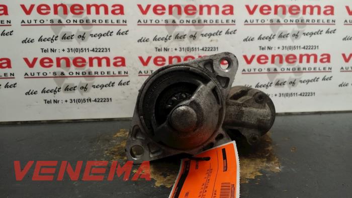 Anlasser van een Mazda 626 (GF12) 1.8i 16V 1999