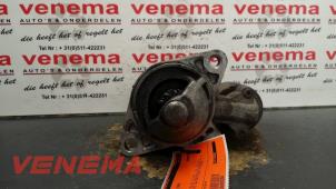Anlasser van een Mazda 626 (GF12) 1.8i 16V 1999