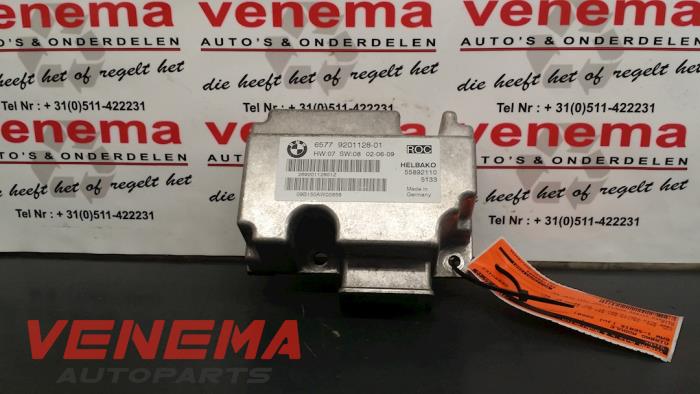 Airbag Module from a BMW 1 serie (E88) 118i 16V 2009