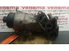 Oil filter housing from a Citroen DS3 (SA), 2009 / 2015 1.6 e-HDi, Hatchback, Diesel, 1.560cc, 68kW (92pk), FWD, DV6DTED; 9HP, 2009-11 / 2015-07, SA9HP 2013