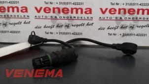 Klopfsensor van een BMW 3 serie (E90) 320i 16V 2008