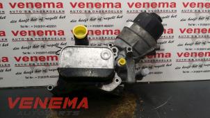 Używane Obudowa filtra oleju Opel Corsa D 1.3 CDTi 16V ecoFLEX Cena € 60,00 Procedura marży oferowane przez Venema Autoparts