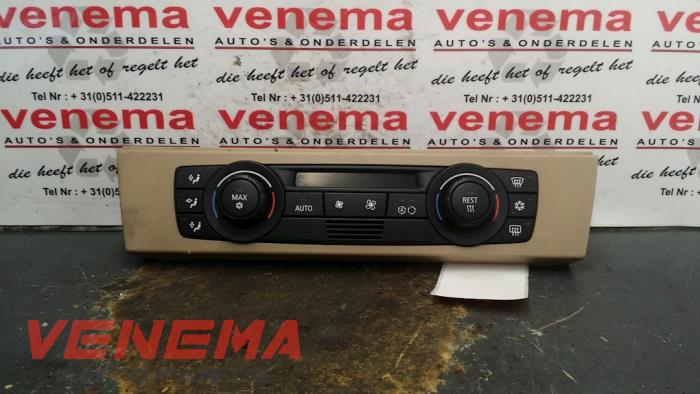 Heater control panel from a BMW 3 serie Touring (E91) 330d 24V 2006