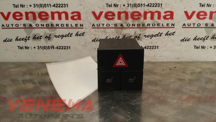 Seat heating switch from a Opel Meriva 1.4 16V Twinport 2006