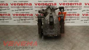 Used Rear brake calliper, left Opel Zafira (M75) 1.7 CDTi 16V Price € 39,00 Margin scheme offered by Venema Autoparts