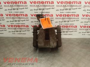 Used Rear brake calliper, left Opel Tigra Twin Top 1.4 16V Price € 45,00 Margin scheme offered by Venema Autoparts