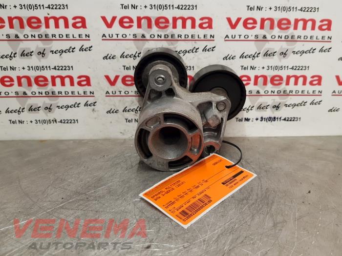 Drive belt tensioner from a BMW 3 serie Touring (F31) 318d 2.0 16V 2014