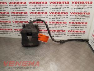 Used Front brake calliper, left Volkswagen Polo V (6R) 1.2 TSI Price € 24,99 Margin scheme offered by Venema Autoparts