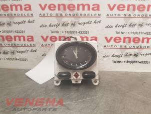 Used Clock Ford Escort 6 (AAL/ABL) 1.6 16V Price € 12,95 Margin scheme offered by Venema Autoparts