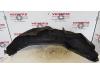 Wheel arch liner from a BMW X1 (E84) sDrive 20i 2.0 16V Twin Power Turbo 2014