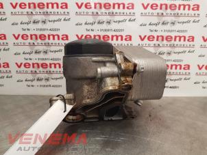 Used Oil filter housing BMW X1 (E84) sDrive 20i 2.0 16V Twin Power Turbo Price € 119,99 Margin scheme offered by Venema Autoparts