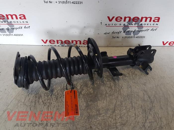 Front shock absorber rod, left from a Renault Clio IV Estate/Grandtour (7R) 0.9 Energy TCE 90 12V 2018