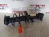 Front shock absorber rod, left from a Renault Clio IV Estate/Grandtour (7R) 0.9 Energy TCE 90 12V 2018