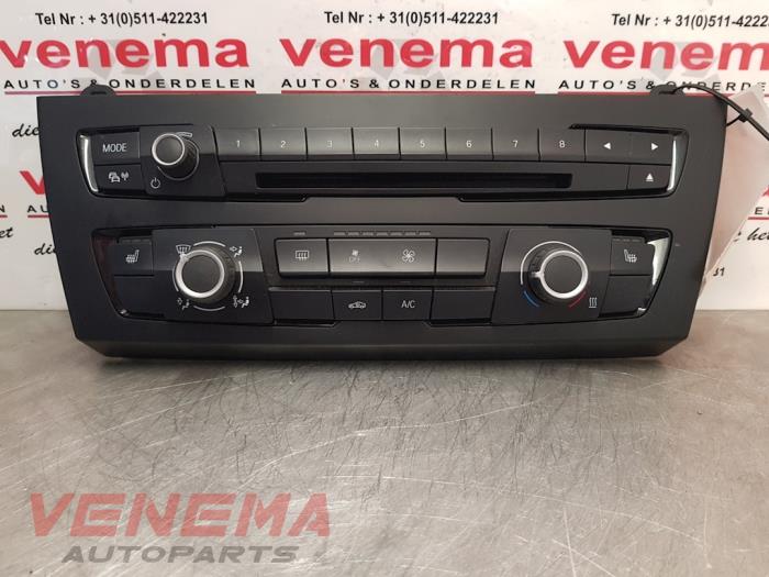 Używane Panel climatronic BMW 1 serie (F20) 116i 1.6 16V Cena € 289,99 Procedura marży oferowane przez Venema Autoparts