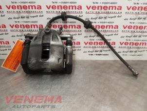 Used Front brake calliper, left Renault Captur (2R) 0.9 Energy TCE 12V Price € 39,99 Margin scheme offered by Venema Autoparts