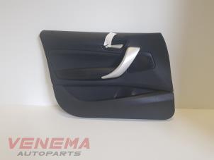 Używane Tapicerka drzwi lewych przednich wersja 4-drzwiowa BMW 1 serie (F20) 116i 1.6 16V Cena € 74,99 Procedura marży oferowane przez Venema Autoparts