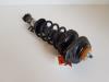Rear shock absorber rod, left from a MINI Mini (R56) 1.6 16V Cooper 2011
