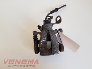Used Rear brake calliper, left Mini Mini (R56) 1.6 16V Cooper Price € 29,99 Margin scheme offered by Venema Autoparts