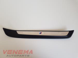 Usados Placa del desgaste del travesaño de la puerta derecha BMW X1 (E84) sDrive 20d 2.0 16V Precio € 24,99 Norma de margen ofrecido por Venema Autoparts