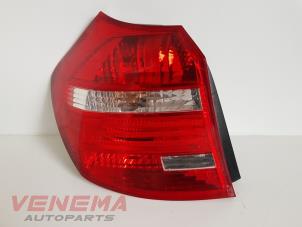 Used Taillight, left BMW 1 serie (E87/87N) 116d 16V Price € 38,99 Margin scheme offered by Venema Autoparts