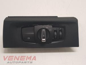 Used Light switch BMW 1 serie (F21) 114i 1.6 16V Price € 34,99 Margin scheme offered by Venema Autoparts