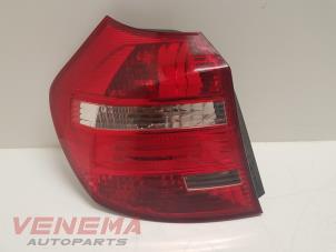 Used Taillight, left BMW 1 serie (E87/87N) 118d 16V Price € 38,99 Margin scheme offered by Venema Autoparts