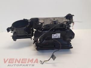 Begagnade Värmarhus BMW 1 serie (E87/87N) 118d 16V Pris € 49,99 Marginaltabell erbjuds av Venema Autoparts