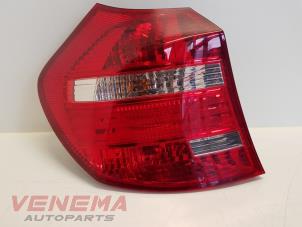 Used Taillight, left BMW 1 serie (E81) 120i 16V Price € 38,99 Margin scheme offered by Venema Autoparts