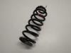 Rear coil spring from a Peugeot 308 SW (4E/H) 1.6 HDi 16V FAP 2012