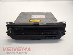 Used Radio CD player BMW 3 serie (E93) 320i 16V Price € 249,99 Margin scheme offered by Venema Autoparts