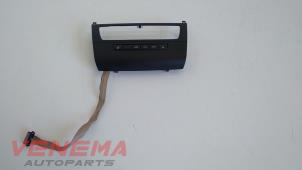 Used Seat heating switch BMW 1 serie (E88) 118i 16V Price € 29,99 Margin scheme offered by Venema Autoparts