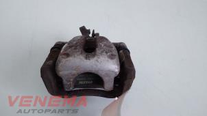 Used Rear brake calliper, right Mini Mini (R56) 1.6 16V Cooper Price € 39,99 Margin scheme offered by Venema Autoparts